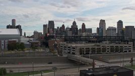 5.7K aerial stock footage descend low while focused on baseball stadium and skyline, Downtown Detroit, Michigan Aerial Stock Footage | DX0002_191_019