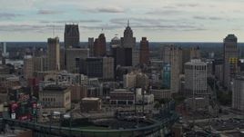 5.7K aerial stock footage focus on the downtown skyline while flying by Comerica Park, Downtown Detroit, Michigan Aerial Stock Footage | DX0002_191_024