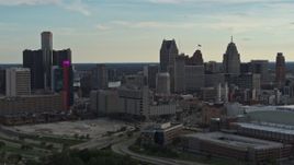 5.7K aerial stock footage slow flyby of the city's skyline at sunset in Downtown Detroit, Michigan Aerial Stock Footage | DX0002_191_036
