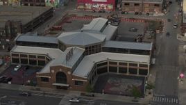 5.7K aerial stock footage orbiting farmers market at sunset in Detroit, Michigan Aerial Stock Footage | DX0002_191_047