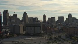 5.7K aerial stock footage flyby the city skyline at sunset, descend with view of courthouse, Downtown Detroit, Michigan Aerial Stock Footage | DX0002_192_005