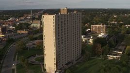 5.7K aerial stock footage orbit side of the City Place Detroit apartment building at sunset, Detroit, Michigan Aerial Stock Footage | DX0002_192_013