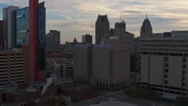 5.7K aerial stock footage of an orbit of the Wayne County Jail Division 1 building at sunset, Downtown Detroit, Michigan Aerial Stock Footage | DX0002_192_023