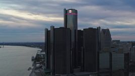 5.7K aerial stock footage approach the GM Renaissance Center skyscraper at sunset, Downtown Detroit, Michigan Aerial Stock Footage | DX0002_192_041