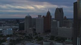 5.7K aerial stock footage approach skyscrapers from the river at sunset, Downtown Detroit, Michigan Aerial Stock Footage | DX0002_192_043
