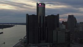 5.7K aerial stock footage circling the GM Renaissance Center skyscraper at sunset, Downtown Detroit, Michigan Aerial Stock Footage | DX0002_192_050