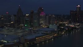 5.7K aerial stock footage orbit skyscrapers at twilight, reveal GM Renaissance Center, Downtown Detroit, Michigan Aerial Stock Footage | DX0002_193_005