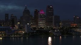 5.7K aerial stock footage a group of tall skyscrapers at twilight, Downtown Detroit, Michigan Aerial Stock Footage | DX0002_193_007