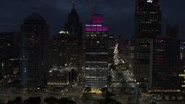 5.7K aerial stock footage of the One Woodward Avenue skyscraper at twilight, Downtown Detroit, Michigan Aerial Stock Footage | DX0002_193_017