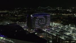 5.7K aerial stock footage of lights on the MotorCity Casino Hotel building at night, Detroit, Michigan Aerial Stock Footage | DX0002_193_019