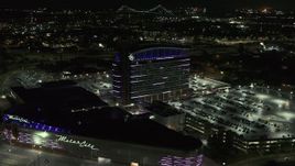 5.7K aerial stock footage orbiting lights on the MotorCity Casino Hotel building at night, Detroit, Michigan Aerial Stock Footage | DX0002_193_021