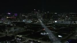 5.7K aerial stock footage a wide view of the city's skyline at night, Downtown Detroit, Michigan Aerial Stock Footage | DX0002_193_022