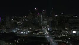 5.7K aerial stock footage of passing by the skyscrapers in the skyline at night, Downtown Detroit, Michigan Aerial Stock Footage | DX0002_193_029