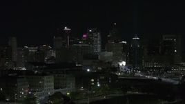 5.7K aerial stock footage of flying past the city's skyline at night, Downtown Detroit, Michigan Aerial Stock Footage | DX0002_193_035