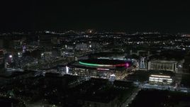 5.7K aerial stock footage of circling Little Caesars Arena at night, Detroit, Michigan Aerial Stock Footage | DX0002_193_040