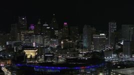 5.7K aerial stock footage ascend from Comerica Park and skyline at night, Downtown Detroit, Michigan Aerial Stock Footage | DX0002_193_051