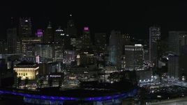 5.7K aerial stock footage fly past skyline at night, reveal Comerica Park, Downtown Detroit, Michigan Aerial Stock Footage | DX0002_193_054