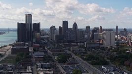 5.7K aerial stock footage of GM Renaissance Center and the city's skyline, Downtown Detroit, Michigan Aerial Stock Footage | DX0002_194_002