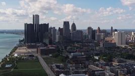 5.7K aerial stock footage of flying by GM Renaissance Center and the city's skyline, Downtown Detroit, Michigan Aerial Stock Footage | DX0002_194_003