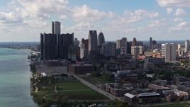 5.7K aerial stock footage approach and flyby GM Renaissance Center and the city's skyline, Downtown Detroit, Michigan Aerial Stock Footage | DX0002_194_005