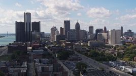 5.7K aerial stock footage descend and flyby GM Renaissance Center and the city's skyline, Downtown Detroit, Michigan Aerial Stock Footage | DX0002_194_007