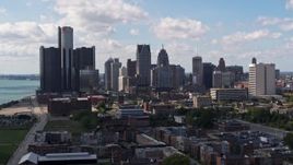 5.7K aerial stock footage of passing GM Renaissance Center and the city's skyline, Downtown Detroit, Michigan Aerial Stock Footage | DX0002_194_008