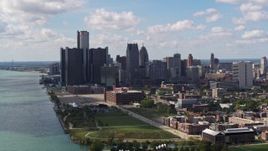 5.7K aerial stock footage of passing by GM Renaissance Center and the skyline in Downtown Detroit, Michigan Aerial Stock Footage | DX0002_194_010