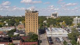 5.7K aerial stock footage of slowly orbiting an apartment building in Detroit, Michigan Aerial Stock Footage | DX0002_194_016