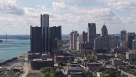5.7K aerial stock footage of slowly passing towering GM Renaissance Center and the skyline in Downtown Detroit, Michigan Aerial Stock Footage | DX0002_194_024