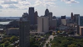 5.7K aerial stock footage of flying by skyscrapers in the city's skyline in Downtown Detroit, Michigan Aerial Stock Footage | DX0002_194_027