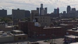 5.7K aerial stock footage of a brick warehouse building in Detroit, Michigan Aerial Stock Footage | DX0002_194_045