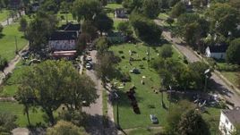 5.7K aerial stock footage orbit and fly away from the Heidelberg Project art display in Detroit, Michigan Aerial Stock Footage | DX0002_195_003