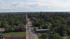 5.7K aerial stock footage of circling urban homes and a church on Mt Elliott Street, Detroit, Michigan Aerial Stock Footage | DX0002_195_015