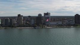 5.7K aerial stock footage orbit riverfront office buildings and Canadian flag in Windsor, Ontario, Canada Aerial Stock Footage | DX0002_196_008