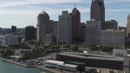 5.7K aerial stock footage ascend away from tall skyscrapers and Hart Plaza, Downtown Detroit, Michigan Aerial Stock Footage | DX0002_196_009