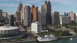 5.7K aerial stock footage approach and orbit tall skyscrapers and Hart Plaza, Downtown Detroit, Michigan Aerial Stock Footage | DX0002_196_012