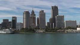 5.7K aerial stock footage a stationary view of tall city skyscrapers beside Hart Plaza, Downtown Detroit, Michigan Aerial Stock Footage | DX0002_196_017