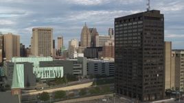 5.7K aerial stock footage stationary view of skyscrapers between police headquarters and office tower in Downtown Detroit, Michigan Aerial Stock Footage | DX0002_196_029