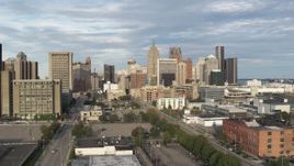 5.7K aerial stock footage of descending while focused on a group of skyscrapers in Downtown Detroit, Michigan Aerial Stock Footage | DX0002_196_032