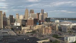 5.7K aerial stock footage orbit a group of skyscrapers, reveal office tower in Downtown Detroit, Michigan Aerial Stock Footage | DX0002_196_036