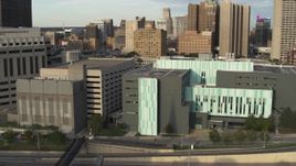 5.7K aerial stock footage of orbiting and approaching the Detroit Public Safety Headquarters in Downtown Detroit, Michigan Aerial Stock Footage | DX0002_196_042