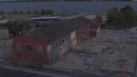 5.7K aerial stock footage of an abandoned Northern Cranes factory building at sunset, Detroit, Michigan Aerial Stock Footage | DX0002_197_011