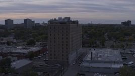 5.7K aerial stock footage of circling an apartment building at sunset, Detroit, Michigan Aerial Stock Footage | DX0002_197_020