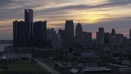 5.7K aerial stock footage of GM Renaissance Center and the city's skyline at sunset, Downtown Detroit, Michigan Aerial Stock Footage | DX0002_197_028