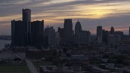 5.7K aerial stock footage of flying by GM Renaissance Center and the city's skyline at sunset, Downtown Detroit, Michigan Aerial Stock Footage | DX0002_197_029