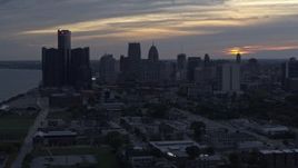 5.7K aerial stock footage slowly passing GM Renaissance Center and the skyline at sunset, Downtown Detroit, Michigan Aerial Stock Footage | DX0002_197_039