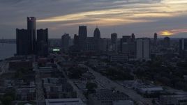 5.7K aerial stock footage view of GM Renaissance Center and the skyline at sunset, Downtown Detroit, Michigan Aerial Stock Footage | DX0002_197_041