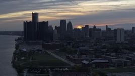5.7K aerial stock footage the riverfront GM Renaissance Center and skyline at sunset, Downtown Detroit, Michigan Aerial Stock Footage | DX0002_197_042