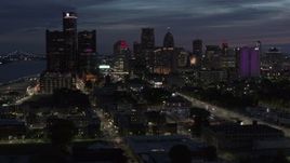 5.7K aerial stock footage of the city's skyline, seen from Jefferson Ave, at twilight in Downtown Detroit, Michigan Aerial Stock Footage | DX0002_198_028