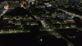 5.7K aerial stock footage of orbiting an apartment complex at night, Downtown Detroit, Michigan Aerial Stock Footage | DX0002_198_051